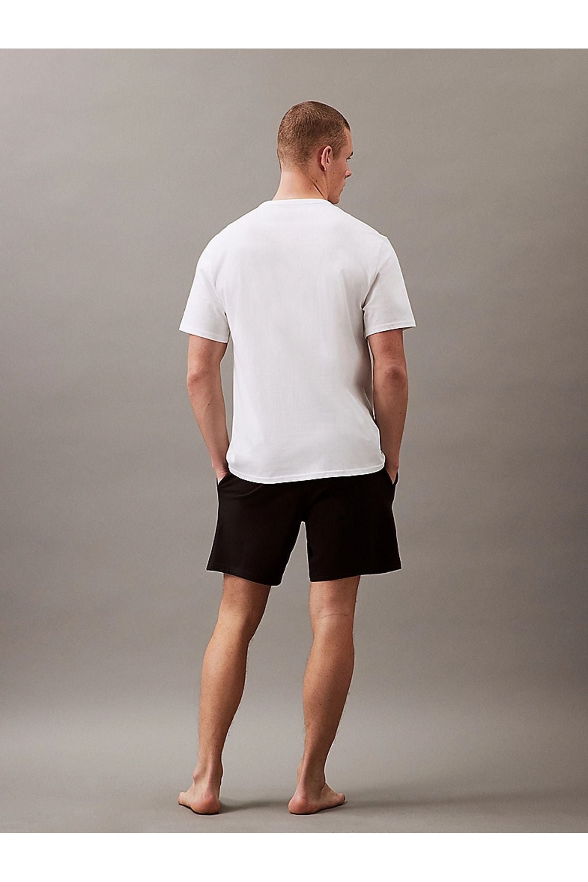 Calvin Klein - Erkek Pamuklu Kısa Kollu Yuvarlak Yaka Beyaz T-Shirt 000NM2567E-100